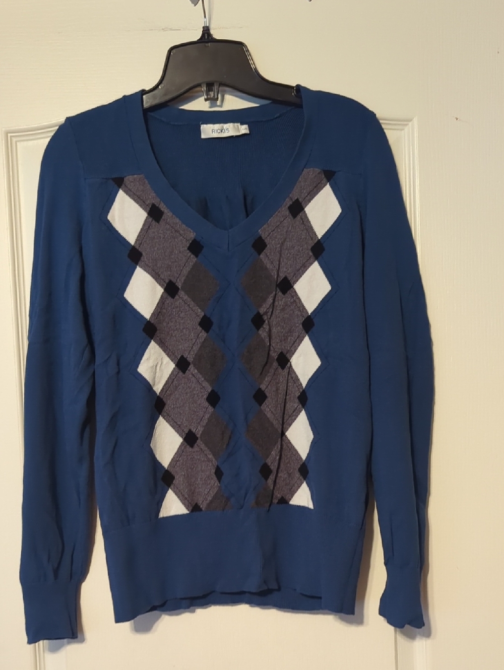 Ricki's Blue Argyle V-Neck Sweater with White and Gray Accents